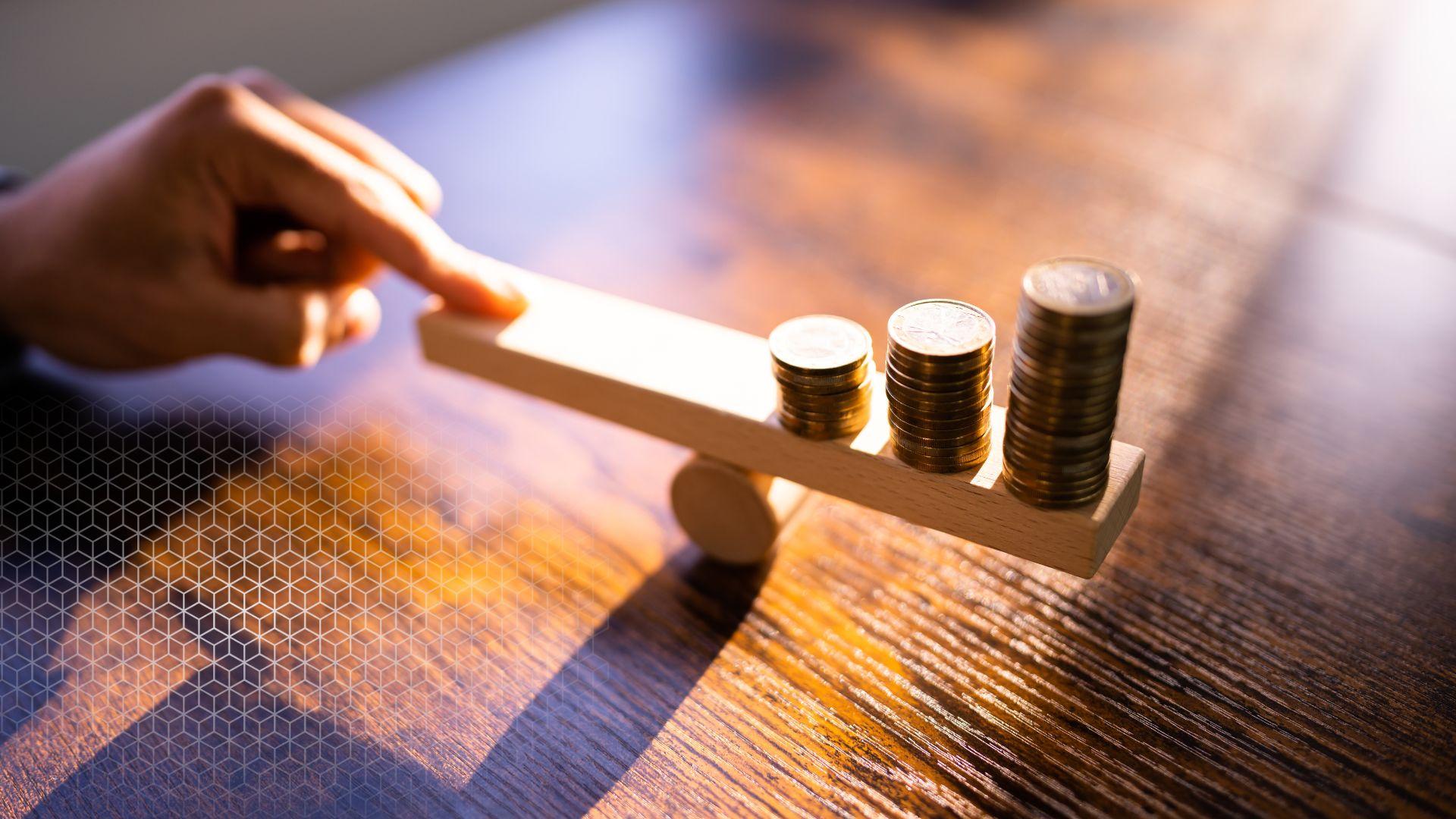 money on a balance scale