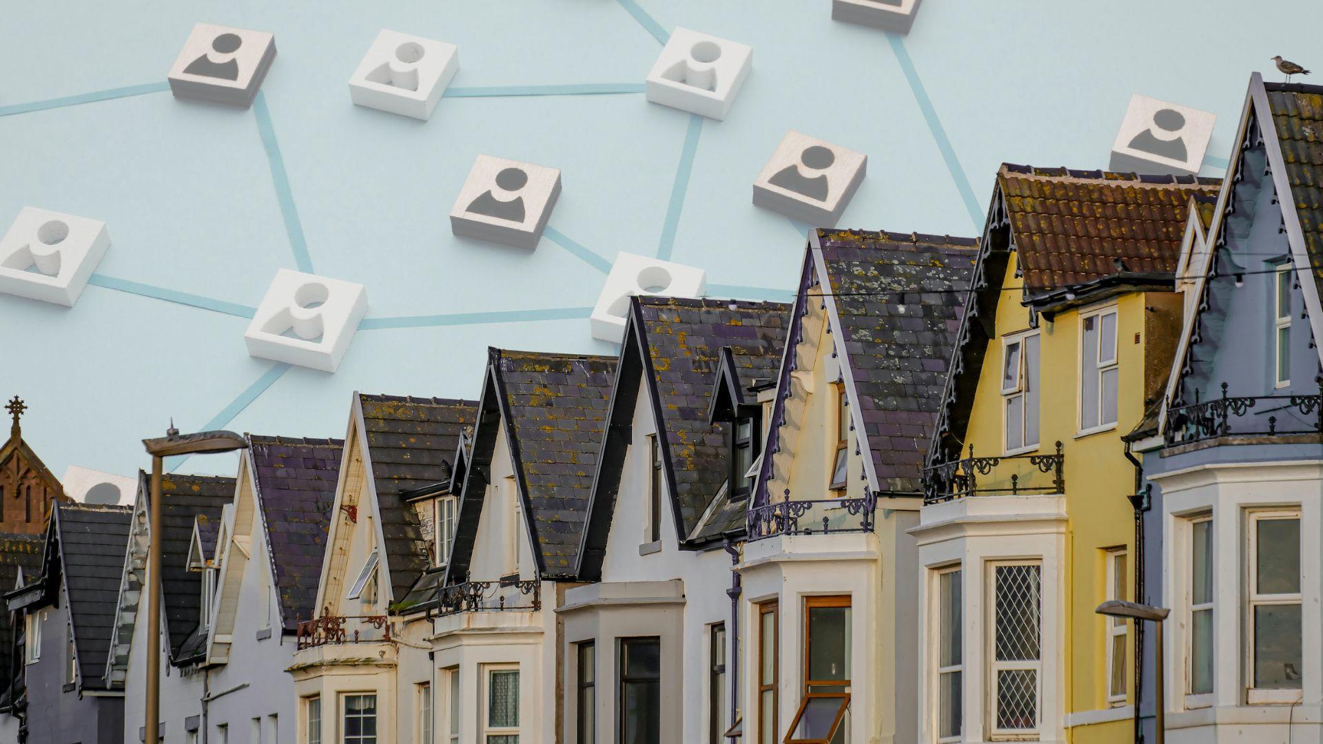 A row of colourful houses in the foreground with a graphic of an interconnected grid with people icons in the background